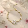 Pulsera Cruzada de Nudo de Lazo Floral Estilo Bosque, Diseño Fresco y Sencillo, Venta Directa del Fabricante, Cobre Ecológico Incrustado con Circonita, Alta Calidad