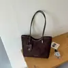 Bolso grande de mano vintage transfronterizo para mujer, nuevo modelo otoño 2026, bolso de hombro simple, bolso tote de moda casual para el día a día