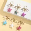 Creativo Vida Marina Colorido Halo Perla Estrella de Mar Llavero Colgante Lindo Colorido Estilo Océano Adorno de Estrella
