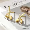 Yanbai Amazon Bestseller Pendientes de Botón Únicos con Forma de X Diamante Brillante Cobre Incrustado Pendientes de Circonita Pendientes de Nicho de Alta Gama