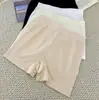 Pantalones cortos de seguridad anti-exposición de seda helada, ropa interior de algodón fresco, dos en uno, no se enrollan, sin costuras, calzoncillos tipo boxer antibacterianos para mujer
