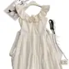 Comercio exterior transfronterizo Sudeste Asiático TK vestido elegante de tirantes con bajo amplio y cinturón para mujer de vacaciones vestido largo