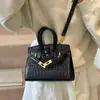 Bolsa Kelly Retrô Tendência Padrão Crocodilo para Mulheres 2026 Novo Modelo Moda de Alto Padrão Bolsa Transversal Versátil Platina
