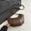 Bolso de cuerno francés de nicho para mujer, bolso de hombro, novedad de verano 2024, bolso de bola de masa, bolso cruzado sencillo y combinable.