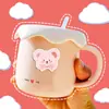 Pegatina decorativa impermeable sin costuras con forma de taza de agua azul para teléfono móvil con expresión de oso y conejo