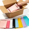 Ventas directas del fabricante: Bolsas de burbujas de colores, bolsas de embalaje para express engrosadas a prueba de golpes y resistentes a la presión, bolsas para express de película coextruida con película perlada