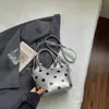 Bolsa de Axila de Lunares Estilo Francés para Mujer Shuai Mi Home Modelo Nuevo 2026 Bolso de Mano Bolso de Hombro Cruzado Simple y Elegante Bolsa de Viaje
