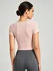 Nuevo estilo de top de yoga asimétrico cruzado con sujetador incorporado, ajuste ceñido, adecuado para Pilates, fitness y entrenamientos, de manga corta, para mujer