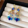Pendientes de Borla de Pétalo de Aguja de Plata Super Hada, Modernos y Versátiles, Pendientes Elegantes con un Toque de Lujo Ligero y de Alta Gama, Pendientes de Nicho para Mujer al por Mayor