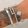 Pulseiras transfronteiriças de aço titânio e aço inoxidável, conjuntos de pulseiras de aço titânio da moda cravejados de diamantes, joias de trevo de quatro folhas femininas, atacado