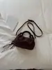 Bolso pequeño cuadrado de gamuza con textura retro transfronterizo para mujer, nuevo bolso versátil y elegante para el hombro y cruzado de 2026