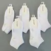 Calcetines bajos para hombre y mujer negros, blancos y grises, calcetines deportivos casuales de algodón, calcetines de cintura baja de color liso para mujer, venta al por mayor de fábrica