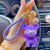Llavero de oso de resina de dibujos animados con lana, creativo para parejas, mochila escolar, celebridad de internet, colgante de oso, llavero de coche exquisito para mujer
