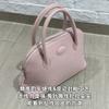 Bolso de mano para mujer, primavera y verano 2023, de piel auténtica, sencillo, moderno, informal, retro, portátil.