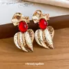 Pendientes de Corazón con Aguja de Plata y Resina Transfronterizos Europeos y Americanos, Pendientes Llamativos de Moda y Únicos con un Toque de Lujo Ligero y Alta Gama para Mujeres