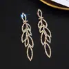 Comercio exterior estilo más vendido cadena de garra con pedrería pendientes para mujer pendientes exagerados pendientes de lujo fábrica directa E801