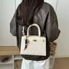 Nova bolsa de ombro da moda, bolsa de mão feminina simples e versátil, bolsa transversal Kelly nichada e única