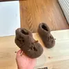 Botas de Nieve Estilo Coreano para Niñas 2025 Invierno Nuevo Estilo Zapatos de Algodón para Bebé Niña Botas Cálidas de Media Caña Más Terciopelo Zapatos Peludos para Bebé