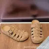Sandálias Romanas Baotou para Mulheres 2026 Novo Verão de Alta Qualidade Modernas Trançadas Vazadas Estilo Birkenstock Tamancos Respiráveis