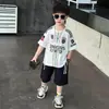 Ropa de Verano Holgada de Manga Corta para Niños Traje Infantil 2026 Nuevo Estilo Coreano para Bebé Conjunto de Dos Piezas con Jeans Rasgados Frescos