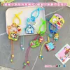 Muñeco Llavero de Acrílico de Página Desplegable Nuevo Original de Crayon Shin-Chan Colgante para Mochila de Estudiante Suministro de Regalo Fuente