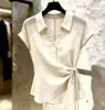 Nuevo top de camisa de manga corta elegante estilo francés para verano, fino, para mujer, con cinturón para ceñir la cintura, diseño calado, moderno y versátil