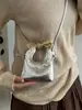 Bolso pequeño dulce y lindo para mujer, nuevo bolso de mano versátil estilo coreano para lápiz labial y monedas, adecuado para citas, bolso de hombro o cruzado, transfronterizo