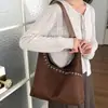 Bolso de mano retro estilo coreano al por mayor, bolso de mujer, nueva colección otoño 2026, color liso, bolso de hombro simple, adecuado para ir al trabajo, se puede llevar debajo del brazo