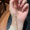 Pulsera de Anillo Corredizo Cruzada Exquisita Retro Francesa Diseño de Nicho Moda Lujo Ligero Gama Alta Simple Versátil Joyería