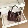Bolsa Tote Camurça Casual Elegante de Grande Capacidade 2026 Outono/Inverno Nova para o Trabalho Super Popular Bolsa de Ombro Único Feminina