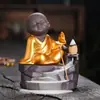 Estufa de aromaterapia de sándalo de reflujo de arena púrpura cerámica transfronteriza piedra creativa agua que fluye alta montaña monje pequeño humo estufa de incienso de reflujo