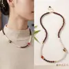Nuevo conjunto de pulsera, collar y anillo de perlas Shijia de sándalo con hilo de oro de estilo chino, con un diseño artístico y vintage con cuentas de sándalo con hilo de oro