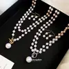 Conjunto de colar com gancho de orelha e pingente de borla de pérolas estilo francês, corrente de clavícula de luxo leve e de alta qualidade, acessório moderno e versátil