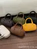 Bolsa Única com Textura para Mulheres, Novo Modelo 2026, Pequena Bolsa Quadrada com Padrão Trançado, Bolsa de Ombro e Transversal Estilo Vintage
