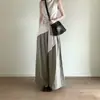 Um Conjunto Completo com um Toque Vintage de Luxo, um Conjunto de Duas Peças Muito Estiloso com Top Sem Mangas e Calça Longa para o Verão de 2026