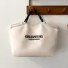 Bolso de Gran Capacidad Estilo Coreano Diseño de Nicho Bolso Moda Nueva Primavera 2026 Bolso de Tela Simple Ligero para Mujeres