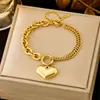 Pulsera de joyería de moda dorada ins para combinar con todo, pulsera de acero de titanio simple de lujo ligero, trébol de cuatro hojas para mujer, transfronteriza