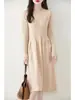 Vestido de punto de lana pura con cuello redondo hueco y falda plisada para mujer, nuevo para otoño e invierno, suéter, falda hasta la rodilla, falda base
