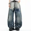 26 Novedades de Primavera en Stock Moda Callejera Americana High Street Diseño Personalizado Dobladillo Curvo Pantalones de Mezclilla Pantalones Casuales para Pareja