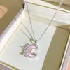 Colar Clássico de Trevo de Quatro Folhas em Aço Titânio Mais Vendido para Mulheres, Design de Nicho, Luxo Leve, Corrente de Clavícula Totalmente Cravejada com Zircônia Diamante