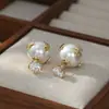 Pendientes de Perla y Circonita Rosa de Lujo Ligero y Gama Alta 2025 Nuevo Diseño de Celebridad de Internet Femenina Elegante y Versátil