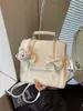 Mochila de Doble Hombro con Lazo para Mujer 2026 Nuevo Estilo Popular Moderna para Estudiante Viaje Diario Escolar Mochila Estilo Universitario