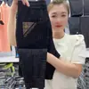 Pantalones casuales de verano nuevos de alta gama para hombre, pantalones de seda helada, estilo europeo, a la moda, modernos, elegantes, pantalones casuales versátiles para hombre