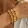 Suministrados directamente por el fabricante, los brazaletes de acero inoxidable son un gran éxito en todas las fronteras, Brazaletes de Acero de Titanio, Moda Europea y Americana Brazaletes Chapados en Oro 18K que No se Desvanecen