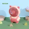Nuevo ventilador de mano de dibujos animados portátil para exteriores con carga ventilador pequeño para estudiantes niños ventilador eléctrico venta al por mayor de fábrica
