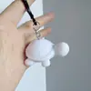 Llavero de oso con líquido diy llavero de conejo con líquido blanco al por mayor oso cabeza grande oso bloque de construcción hombre espacial pequeño leche Dragón