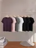 Camiseta elástica de alta calidad con cuello redondo de Lyocell para mujer, estilo básico simple de verano, hombro normal, top versátil de manga corta