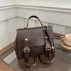 Estilo universitário bolsa retrô feminina 2025 nova primavera mochila viajante ombro classe mochila cross border