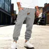 Pantalones deportivos casuales para hombre transfronterizos con cordón, nuevo estilo europeo y americano de Amazon, pantalones largos holgados de color liso, pantalones apilados con puños para primavera y otoño