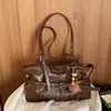 Bolsa de Hombro Transfronteriza Retro Maillard 2026 Otoño/Invierno Nueva Tendencia Moda Nicho Simple para el Trabajo